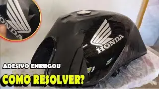 Adesivo enrugou como trocar
