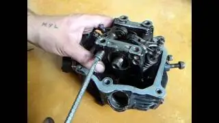 como sacar balancines y arbol de levas de una moto pulsar 135