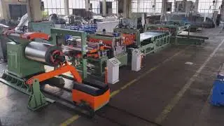 Cut to length line with fly cut-off shear guillotine and automatic sheet stacker