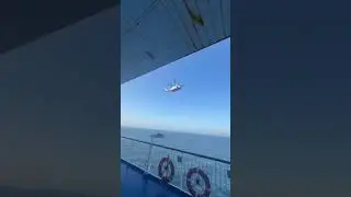 HM Coastguard flies alongside vessel
