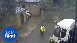 Council rubbish collectors drive into parking post in London