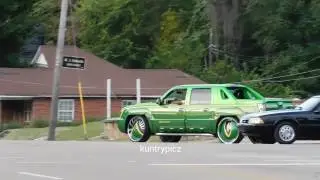 Green & yellow Avalanche on dub floaters in traffic