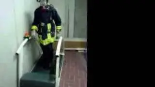 firefighter on treadmill ergometer. Feuerwehr Atemschutz-&Uuml;bungssstrecke mit Laufband