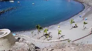 Playa de San Juan in Tenerife, Spain - Walk along the coast in October.