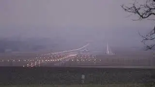 Zurich Airport Fly Tyrol private jet Cessna Citation XLS OE-GKE landing on a foggy winter day.