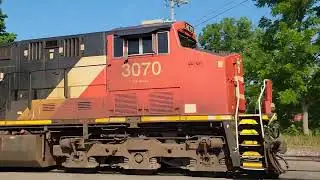 CN 3070, 3366 Eastbound train with GACX Potash, MLGX, Prairie Malt Limited covered hoppers