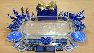 Slime Navy Blue Mixing makeup and glitter into Clear Slime
