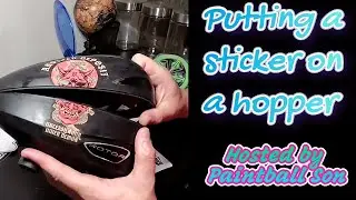 Putting Stickers On Electronic Paintball Hopper w/ Paintball Son