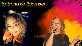 Sabrina Kolbjornsen Experyans mwen ak Riské, Skandal, System Band !