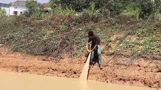 Cast net fishing at countryside in Cambodia