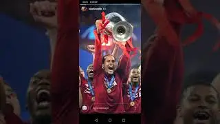 Virgil van dijk holding the champions league trophy