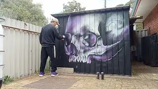 Skull Spray painting glow reflection raw by Harley Akers 