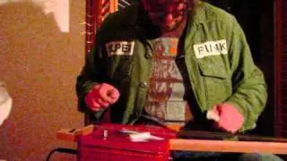 Biscuit Tin Guitar - My first DIY guitar, noisy little f**ker too...