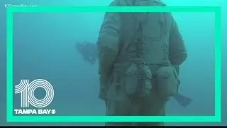 Biologists trying to save underwater memorial from damage
