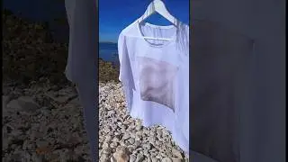 Weightless. Airy. Silk blouse with a hand-painted fragment.