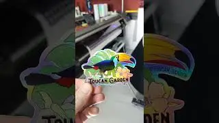 Embossed stickers on holographic vinyl.