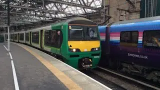 ex-London Midland 320411 & 320412 depart Glasgow Central (4th April 2016)
