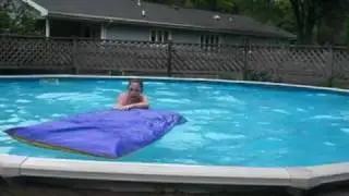 niner and butts diving in the pool