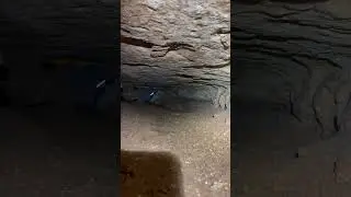 Navigating Tight Squeeze In Cave