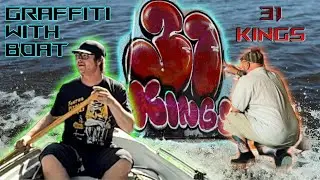 Painting graffiti - got boat ride to beautiful spot