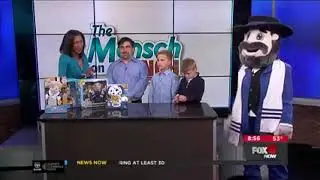 The boy who inspired the Mensch on a Bench joins his father in the TV studio (CUTE)