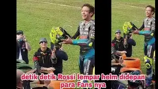 seconds, valentino rossi throws a helmet, a sign of farewell before retiring