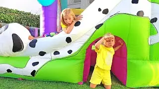 Kids playing with outdoor activity toys