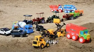 Toy Trucks Working in Sand | Construction Vehicles for Kids