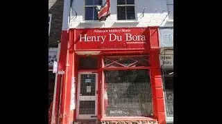 Looking around inside Henry Du Bora Army surplus store.