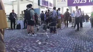 Robots walk, roll and fly into Atlanta showcase