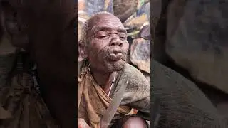 An Elder Enjoying Food in the Hadzabe Way