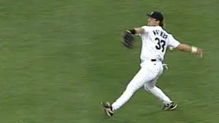 Larry Walker throws out Hal Morris at the dish