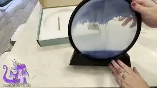 Showcasing costand Moving Sand Art Picture with Round Glass