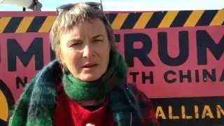 Liz Remmerswaal speaks at the gates of Australia's Military Joint operations command
