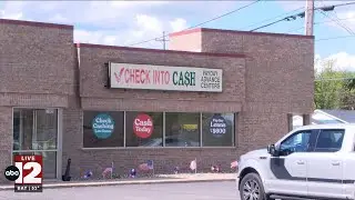 Midland Police investigating an armed robbery at Check Into Cash