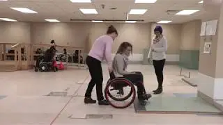Manual Wheelchair Skill: Descends low curb, training with caregiver