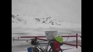 Adam Glover Cycling Snowing on Atigun pass, Alaska