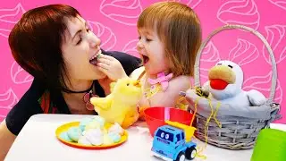 Bianca and her mother are making meringues, and the toys are helping them gather the ingredients.