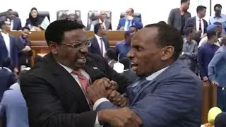 DAAWO: Mucjisadan Hassan Firimbi & Fartaag oo Isku Dhex Feeray Barlamanka Manta Iyo...