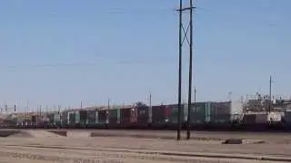 BNSF train 5494 is going West bound through Barstow CA