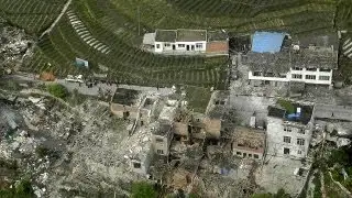 China quake kills scores- thousands injured