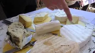 Cutting the cheese at Auberge de la Mole in La Mole, France