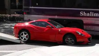 Ferrari California meets a Tour Bus - results of the Ferrari getting side swiped by the bus