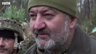 Life for Ukrainian troops dug into Kyiv's trenches   BBC News