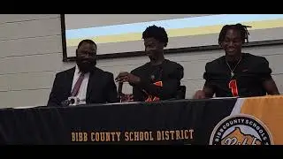 Northeast head coach Jeremy Wiggins, QB Lewis Cheney, WR Kavon Conciauro,