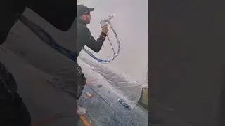 spraying silicone over existing render with the t2 spray machine