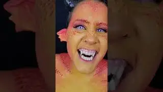 A fire #dragon #Halloween makeup with sharp teeth and #scary eyes! #sfxmakeup #makeup