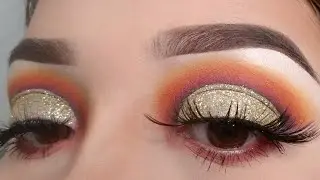 Orange and gold glitter cut crease/ Makeup by Tiny T