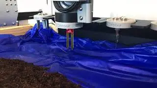 Farmbot in action - planting sesame seed, checking soil moisture and smashing weed