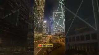 Hong Kong at night, CBD, Central. Pride lighting at HSBC building, Baoli, Bank of China.